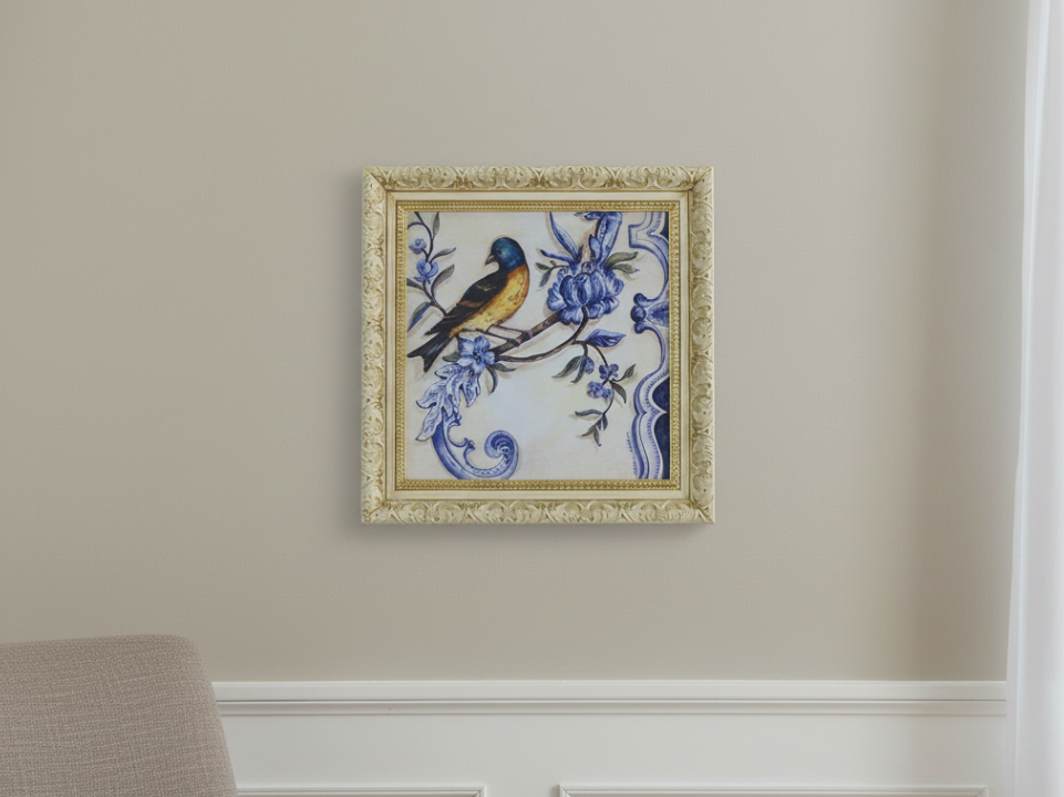 Framed artwork with a bird and floral design on a beige wall. zora store llc