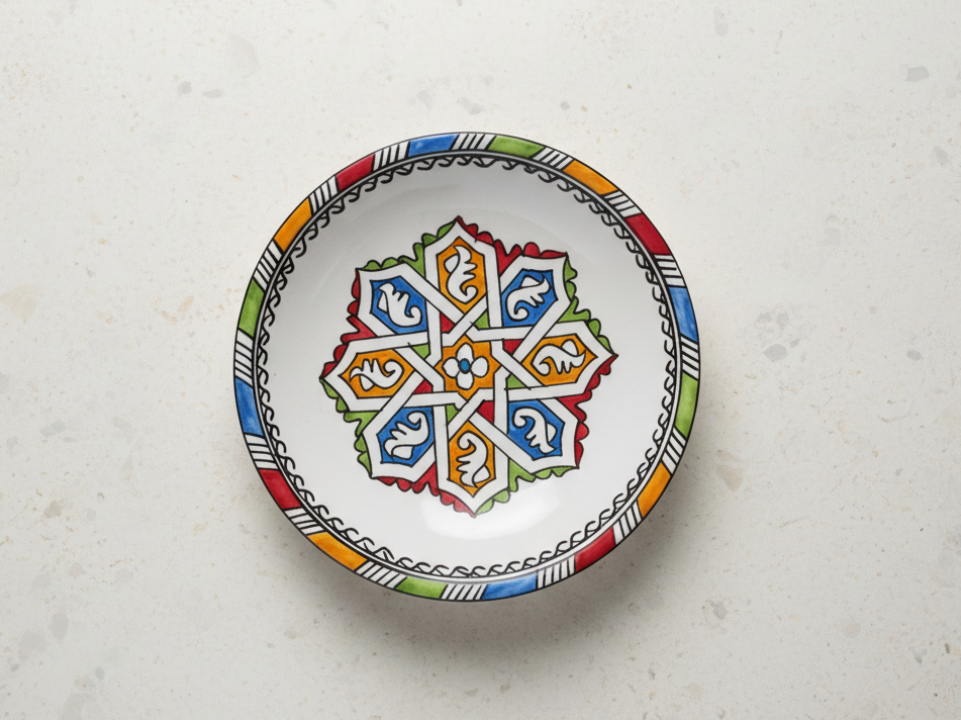 Round ceramic plate with a colorful geometric design - zora store llc