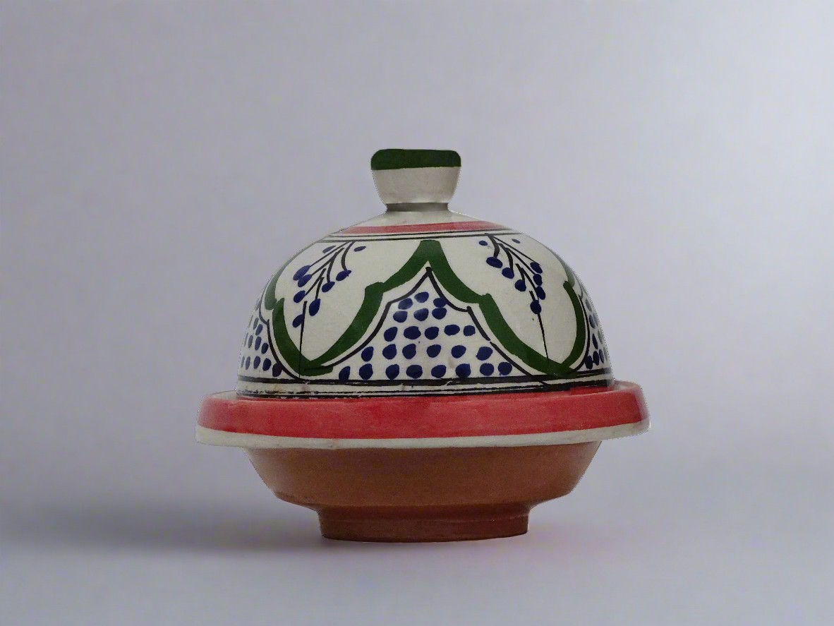 handmade and hand green painted Moroccan tagine.