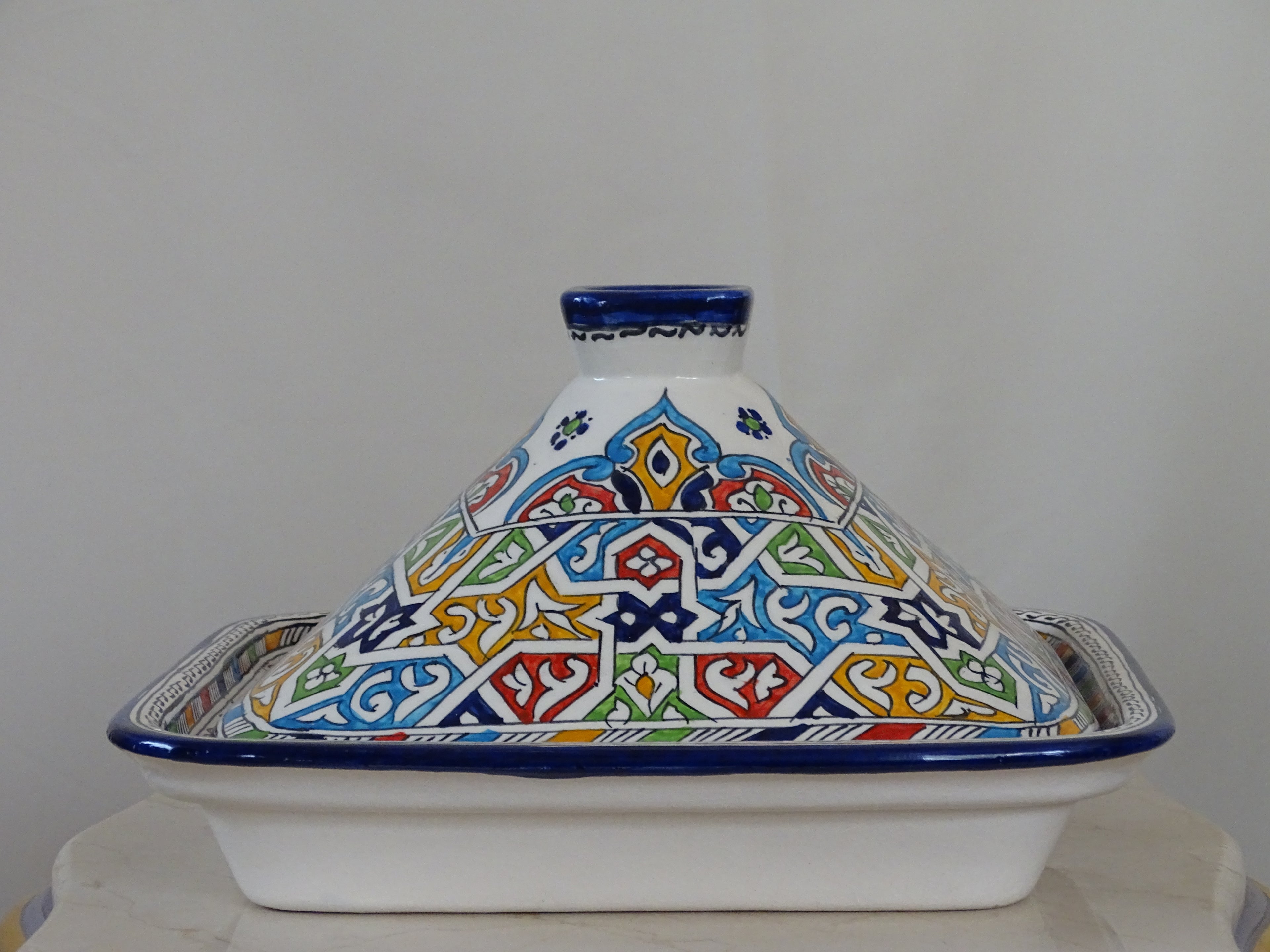 Moroccan Tagine. Hand-painted and designed for  serving, this Tajine brings authentic flavor to your kitchenware